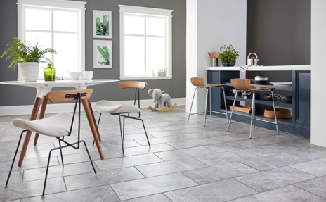Tile flooring with modern furniture.